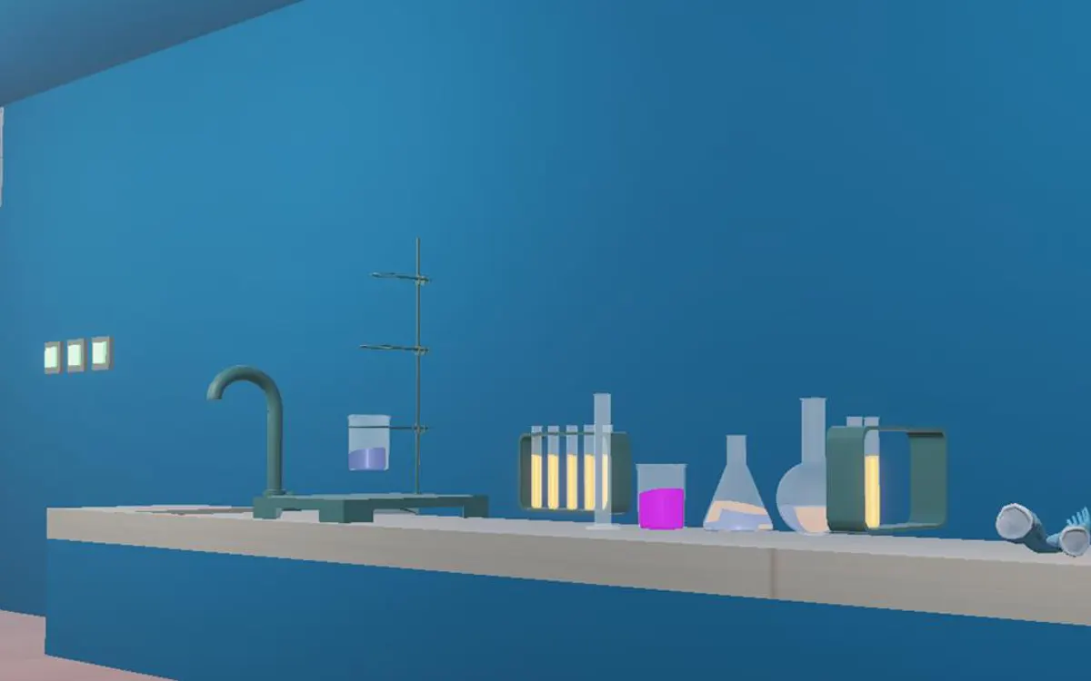 A bench of glassware: flasks, test tubes and a lit spirit lamp.